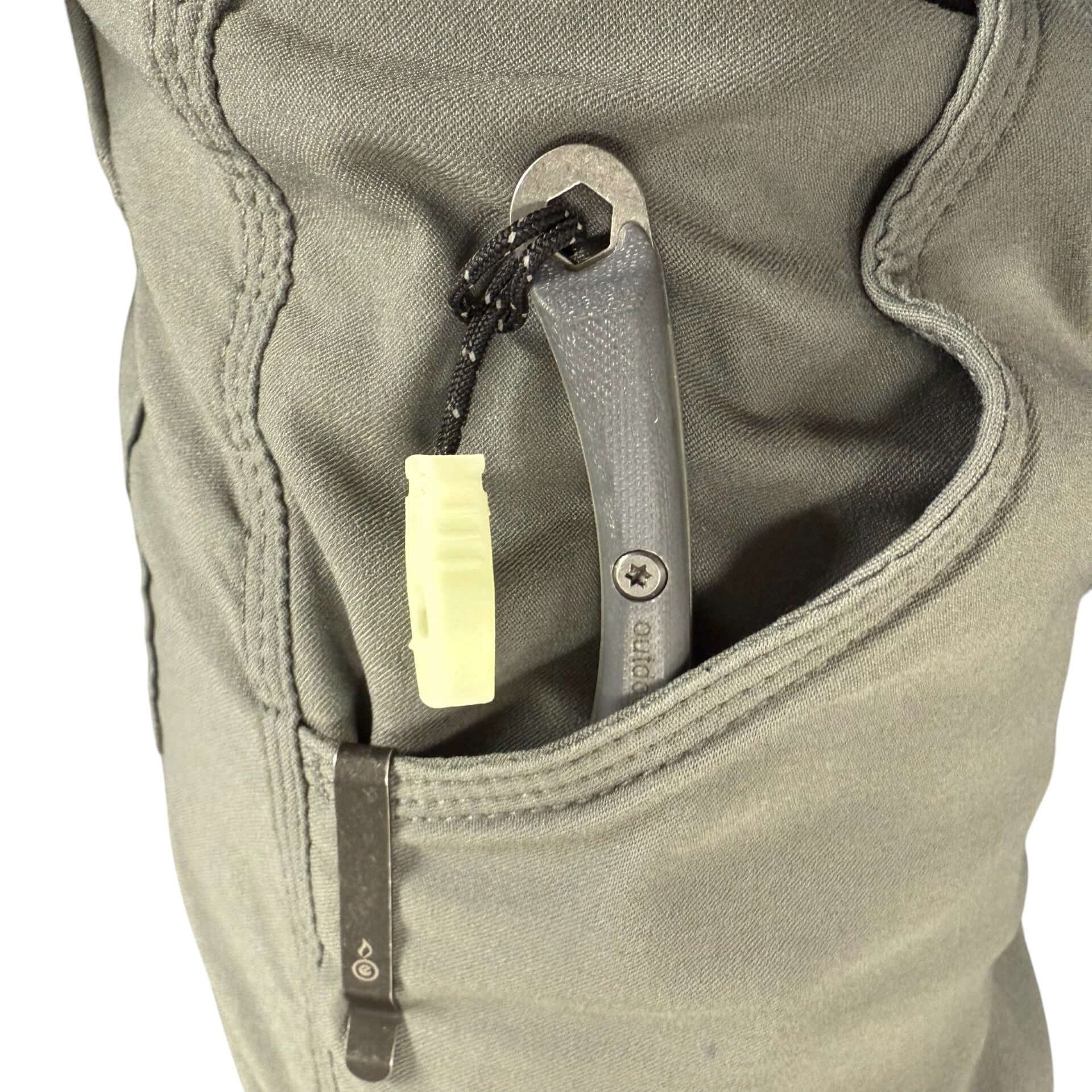 close up of glow feather knife with pocket clip in pocket