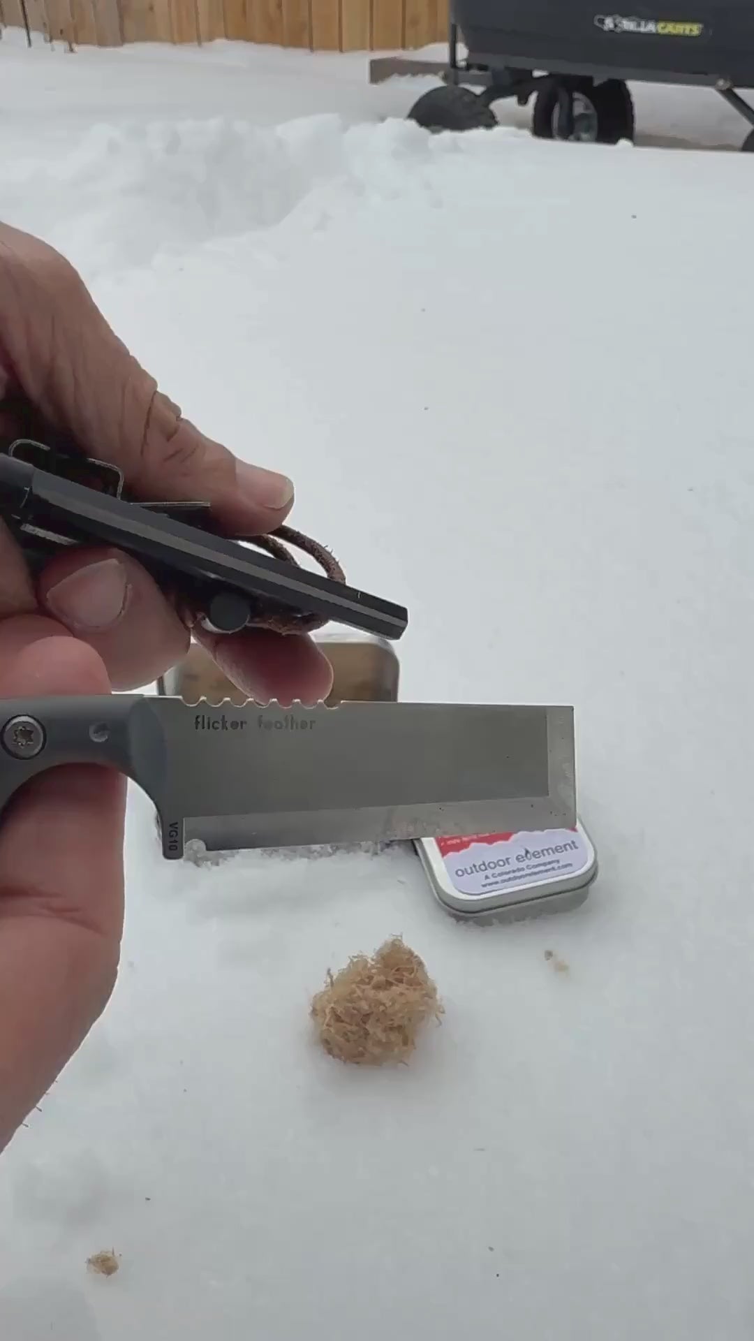 burning fiber light tinder in snow