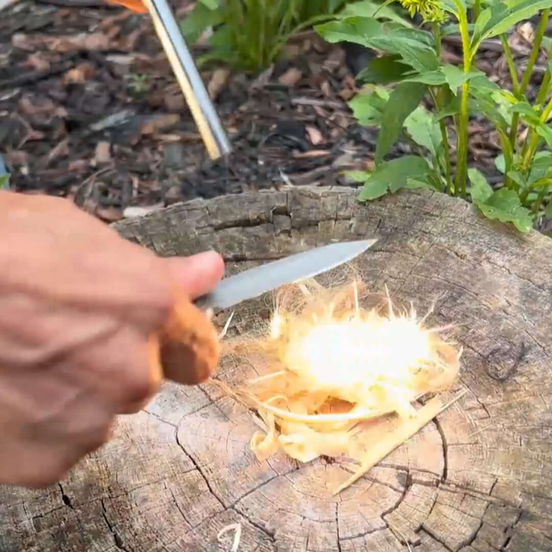 cast sparks easily using the 90 degree section of the spine against any ferro rod with the quick feather edc adventure knife by outdoor element