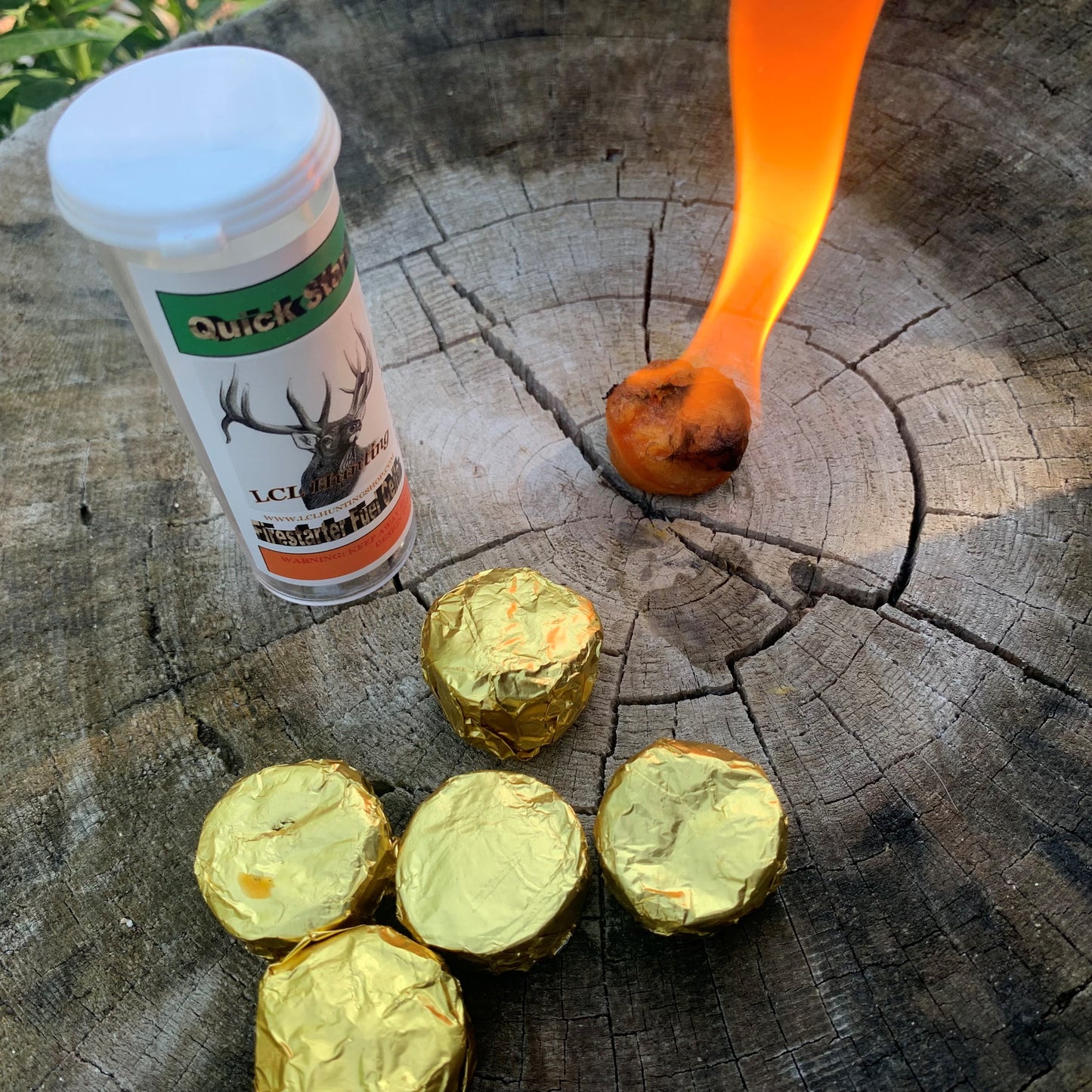 Quick Start Firestarter Fuel Cells burning on tree stump