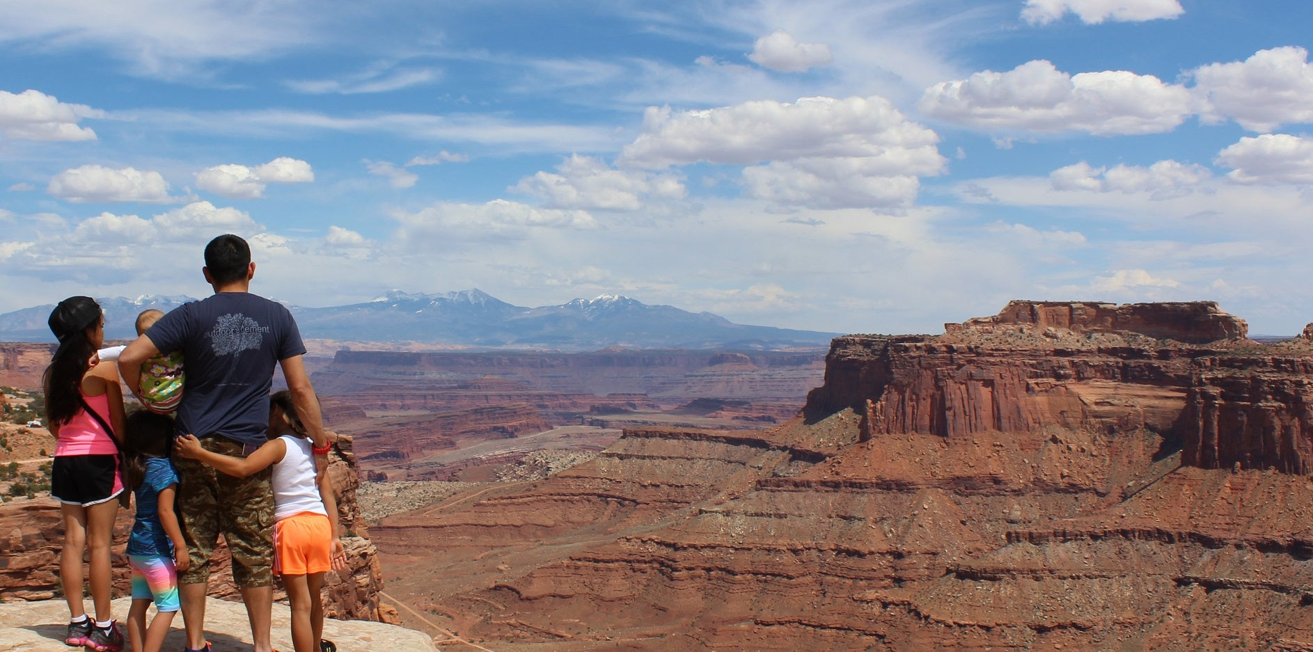 Family overlooking the Grand Canyon. Feel confident taking your family out knowing that you have the gear needed for adventure and survival.