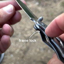 Load image into Gallery viewer, frame lock used for safety in the folding feather knife

