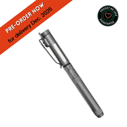 A metallic gray pen shown diagonally on a white background, featuring a red 'PRE-ORDER NOW for delivery Dec. 2026' banner in the top-left corner and a green circular 'Project We Love Kickstarter' logo in the top-right.