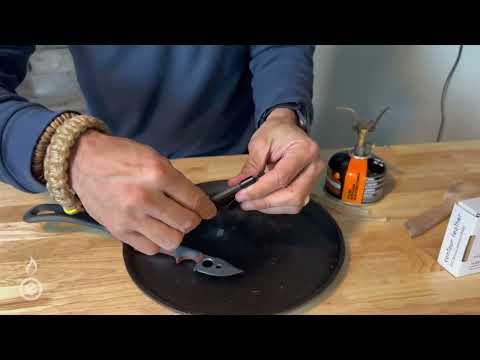 Overview of Contour Feather Adventure Survival Knife by Outdoor Element, 5-in-1 multitool: fire-starter, knife, whistle, sharpener and hex driver.