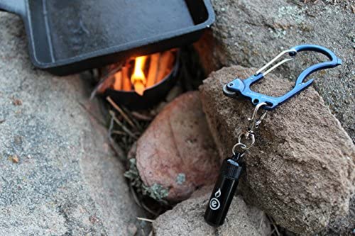 Blue firebiner with black Outdoor Element clipped to hang slot